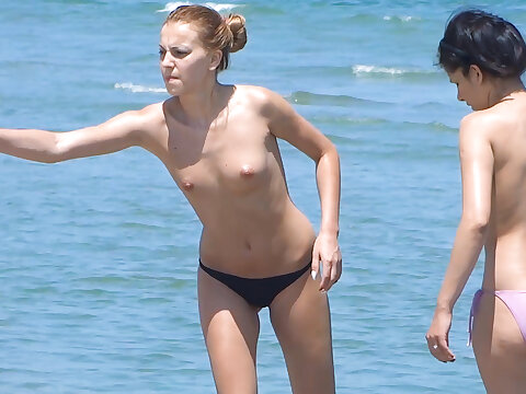 Fresh young nudist femmes enjoy their day at the beach